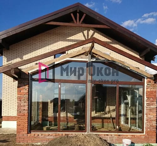Ламинированные пластиковые окна трапециевидной формы Ламинированные пластиковые окна трапециевидной формы